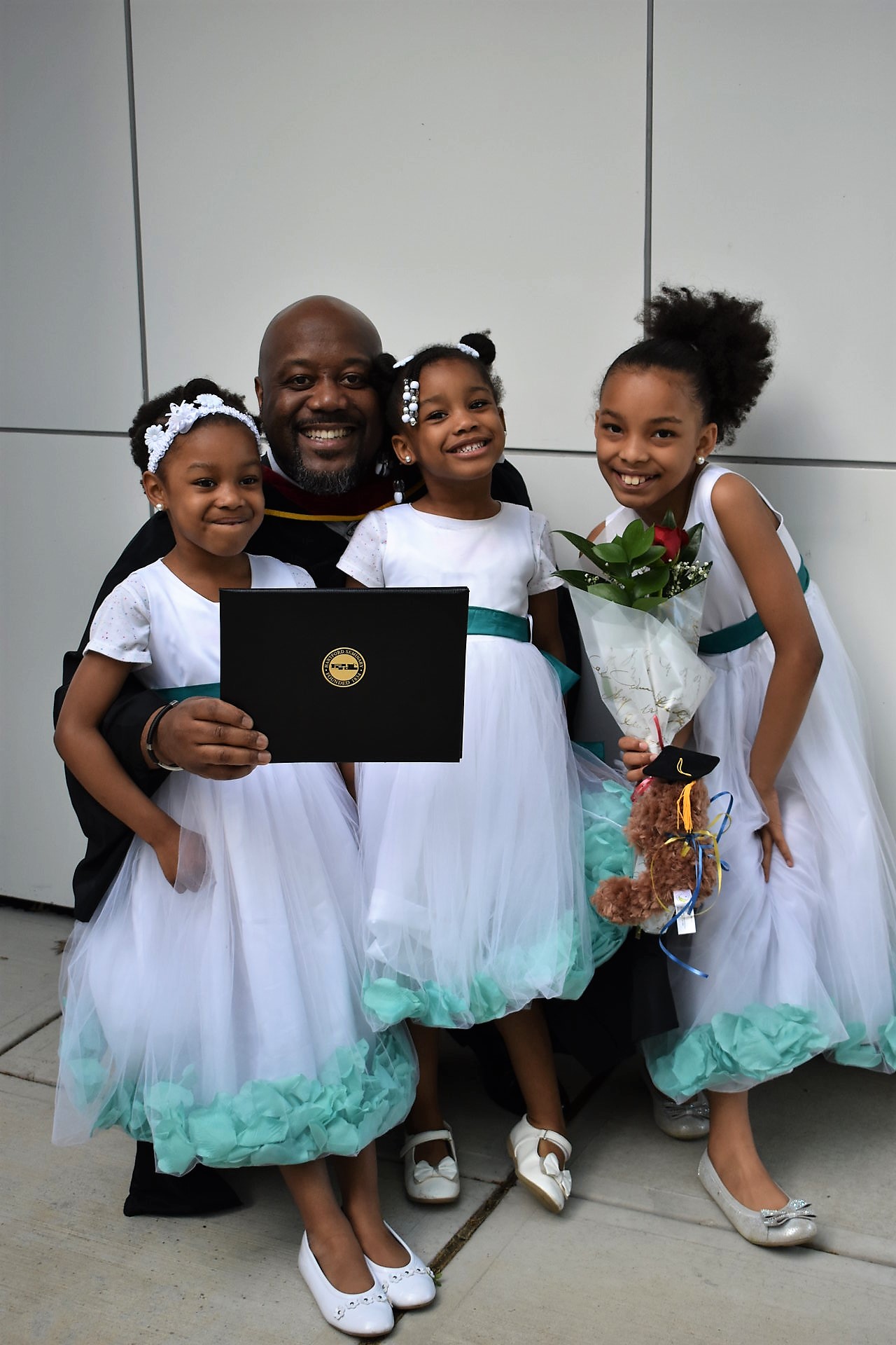 Dad and Girls at Graduation