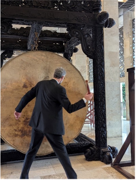 President Lohr ringing gong