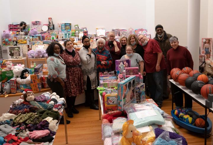 Volunteers with Christmas toys