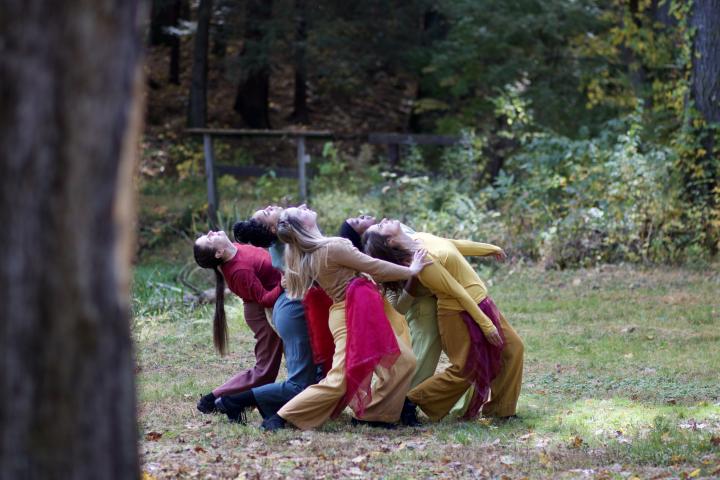 Group of dancers leaning back