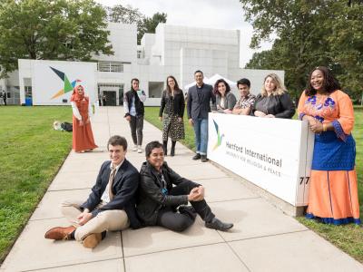 MAP students in front of new sign