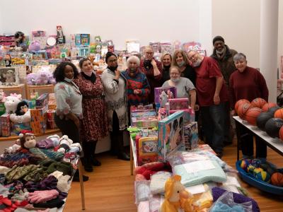 Volunteers with Christmas toys