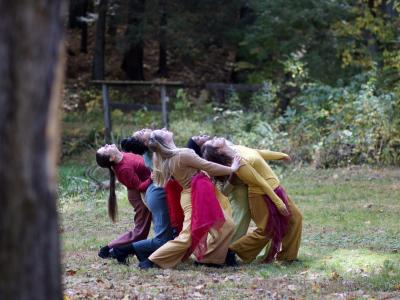 Group of dancers leaning back